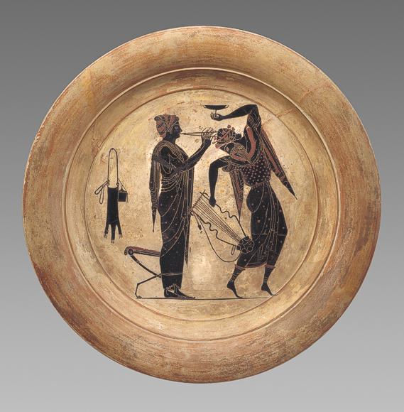Flötenspielerin und Tänzer, Teller aus Athen, Ton, um 520 v. Chr. 
